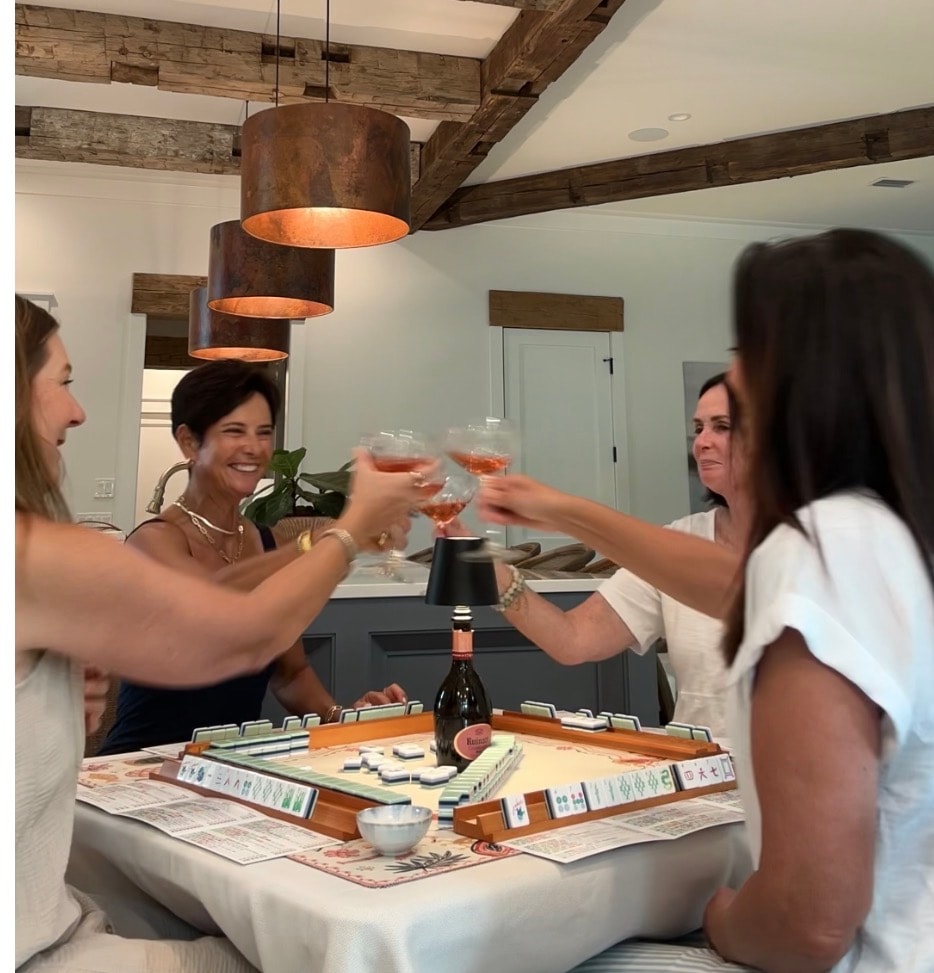 Celebrating around the mahjong table